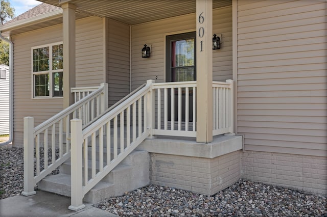 property entrance featuring covered porch