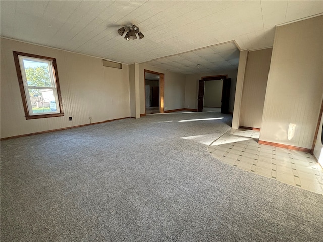 spare room with light carpet