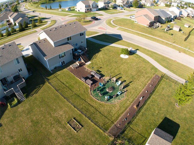 drone / aerial view featuring a water view