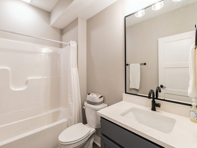 full bathroom with vanity, toilet, and shower / bath combo