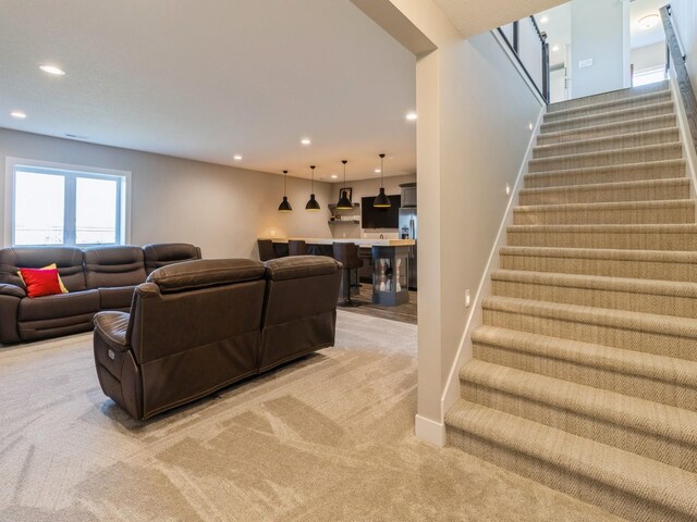 living room featuring light colored carpet