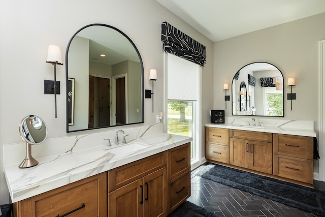 bathroom featuring vanity and plenty of natural light