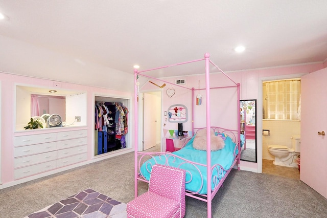 carpeted bedroom featuring a closet