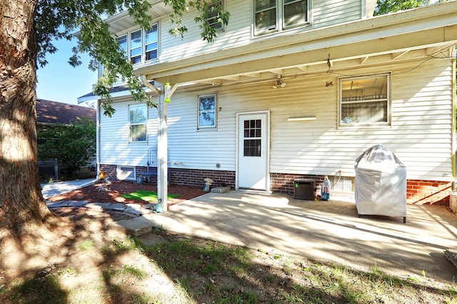 rear view of house with a patio