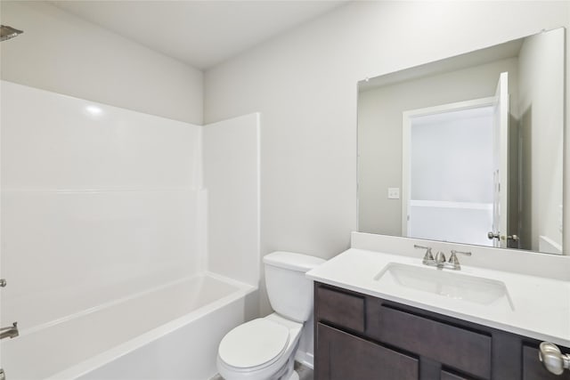 full bathroom featuring toilet, washtub / shower combination, and vanity