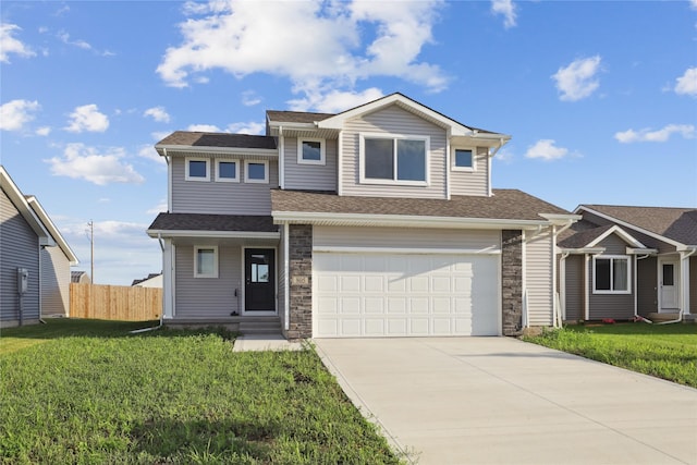 805 3rd St NW, Bondurant, IA 50035 - view of front facade featuring driveway, a garage, a shingled roof, and stone siding