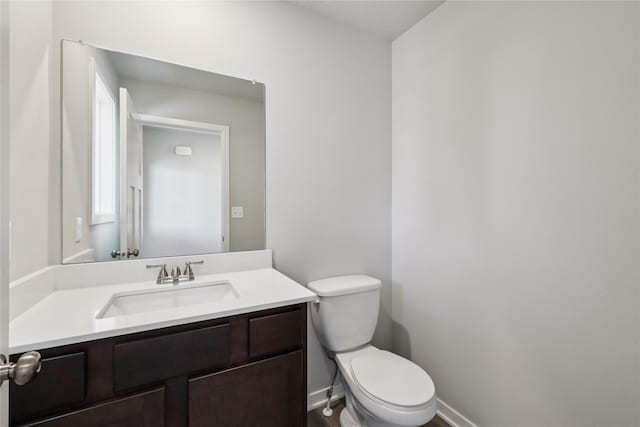 805 3rd St NW, Bondurant, IA 50035 - bathroom with vanity and toilet