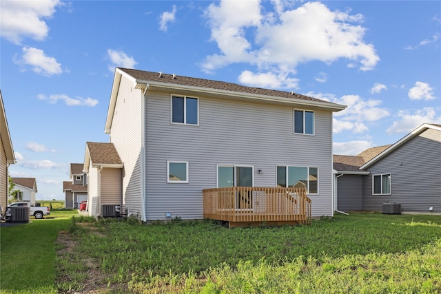 805 3rd St NW, Bondurant, IA 50035 - rear view of house with a lawn and a wooden deck