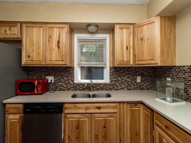5820 Urbandale Ave, Des Moines, IA 50322 - kitchen featuring stainless steel dishwasher, light countertops, tasteful backsplash, and light brown cabinetry