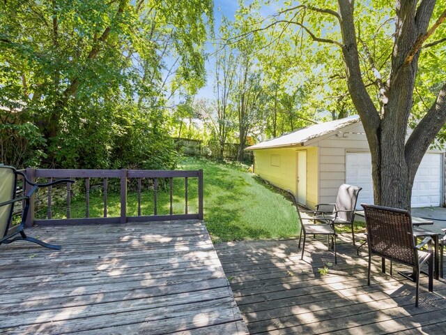 5820 Urbandale Ave, Des Moines, IA 50322 - wooden terrace with a lawn and outdoor dining space