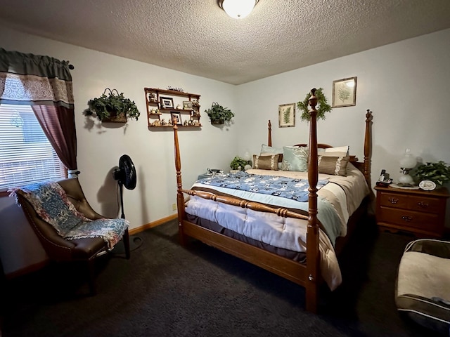 carpeted bedroom with a textured ceiling