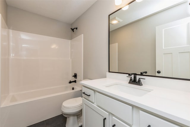 full bathroom with tile patterned flooring, vanity, shower / bath combination, and toilet