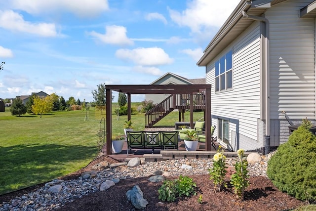 view of yard with stairway and a wooden deck