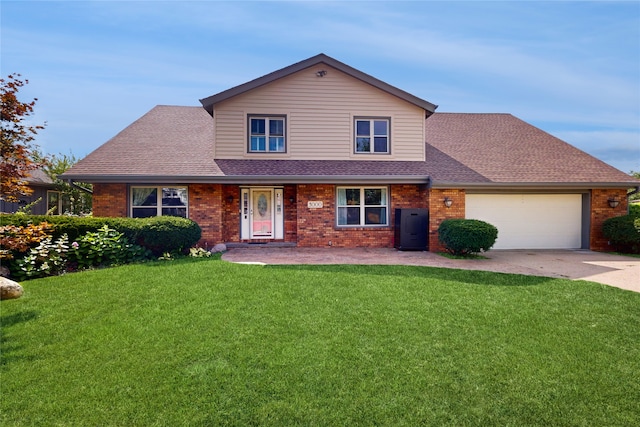 front facade featuring a garage and a front yard