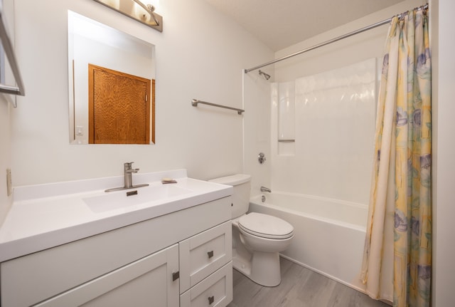 full bathroom featuring vanity, toilet, hardwood / wood-style floors, and shower / bathtub combination with curtain