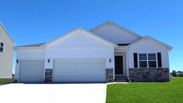 view of front of property with a garage, stone siding, concrete driveway, and a front lawn