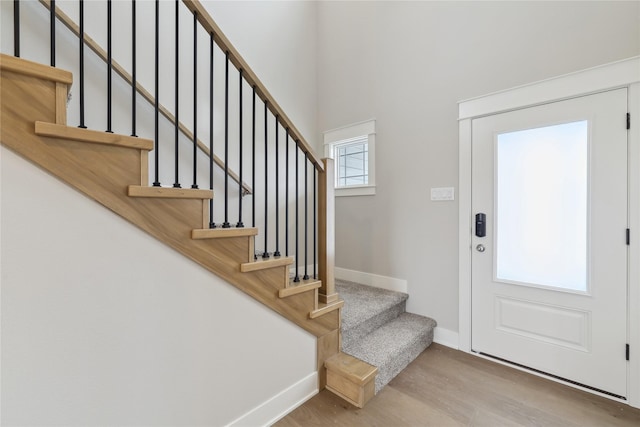 entryway with light hardwood / wood-style floors