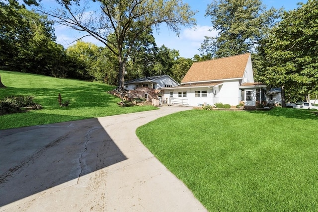 exterior space featuring a front yard