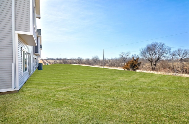 view of yard featuring central AC