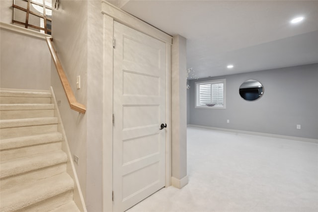 stairway featuring carpet floors, baseboards, and recessed lighting