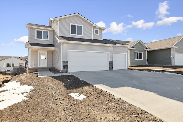 view of front of home with a garage