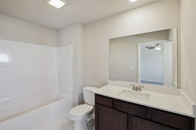 full bathroom with shower / tub combination, vanity, tile patterned flooring, and toilet