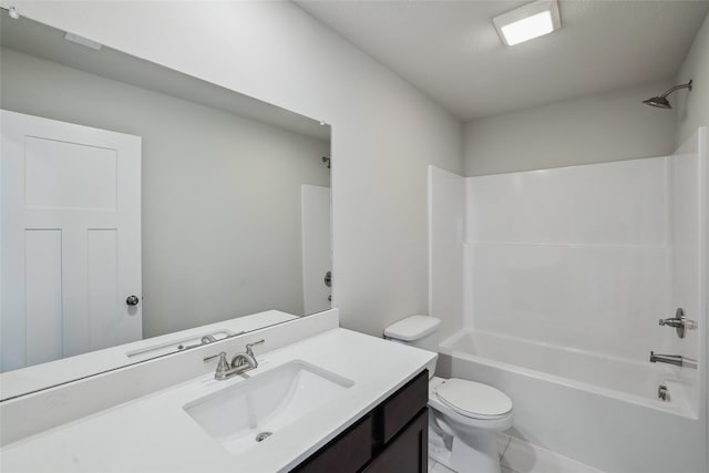 full bathroom featuring vanity, tile patterned floors,  shower combination, and toilet