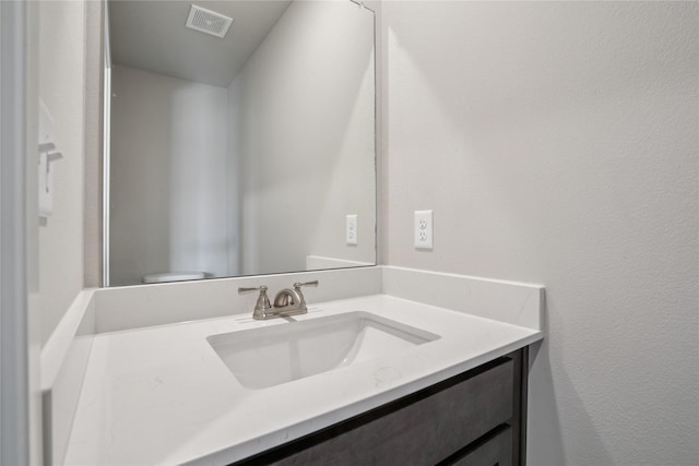 904 Spruce Ave, Norwalk, IA 50211 - bathroom with vanity and toilet