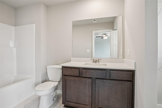 904 Spruce Ave, Norwalk, IA 50211 - full bathroom with vanity, toilet, a ceiling fan, and  shower combination
