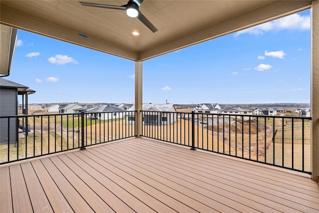 wooden terrace with ceiling fan