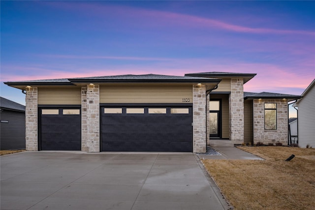 prairie-style house with a garage