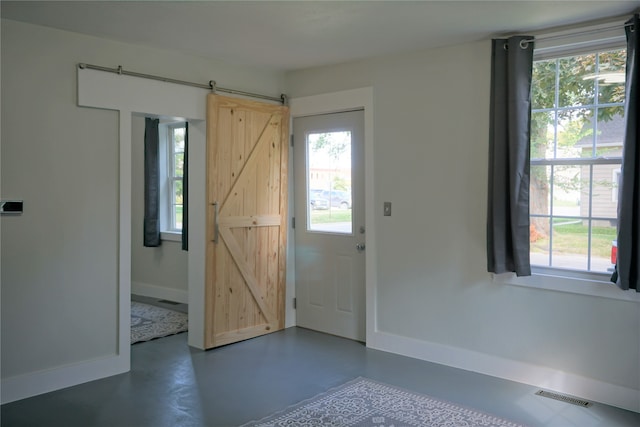 entryway with a barn door