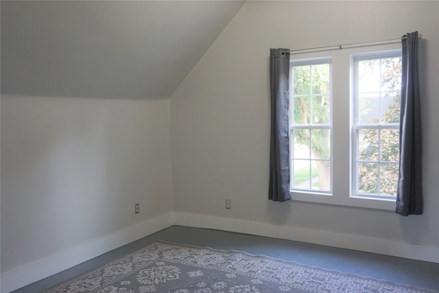 additional living space with lofted ceiling