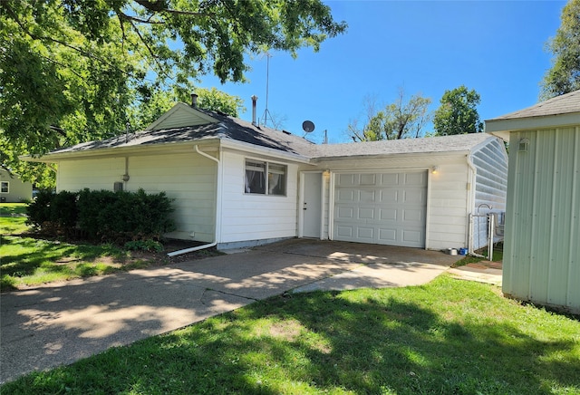 single story home with a garage and a front yard