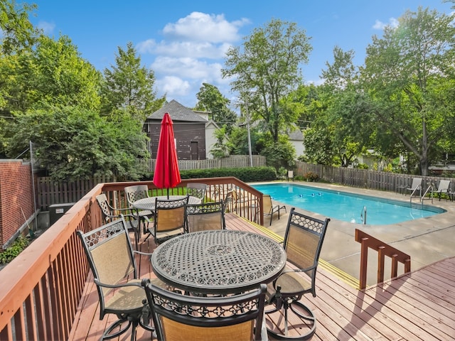 view of pool with a wooden deck