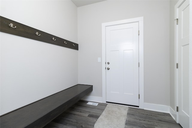 mudroom with dark hardwood / wood-style floors