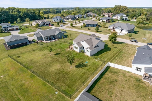 birds eye view of property with a residential view