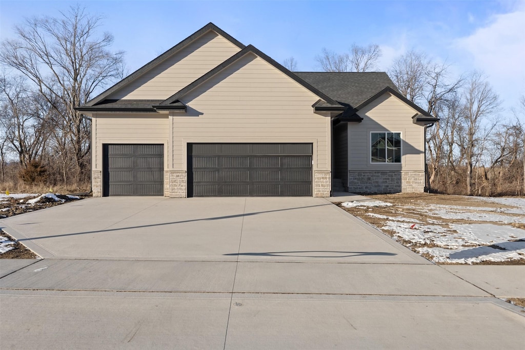 1103 2nd St NE, Altoona, IA 50009 - view of front of home featuring a garage