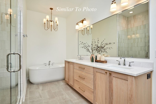 10622 NW 80th Ave, Johnston, IA 50131 - full bath with double vanity, a shower stall, a soaking tub, and a chandelier