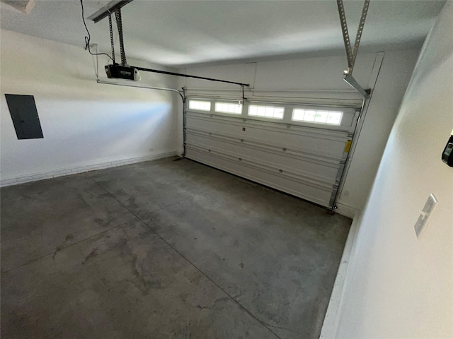 garage with electric panel and a garage door opener