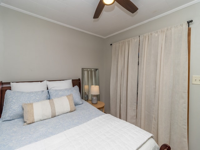 bedroom with crown molding and ceiling fan