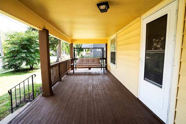 wooden deck featuring a porch