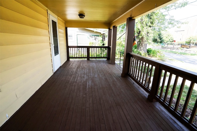 wooden deck featuring covered porch