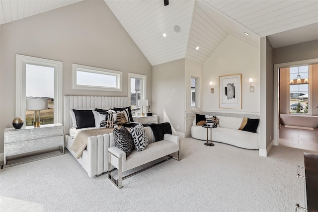 18252 Valleyview Cir, Clive, IA 50325 - carpeted bedroom with multiple windows, lofted ceiling, and recessed lighting