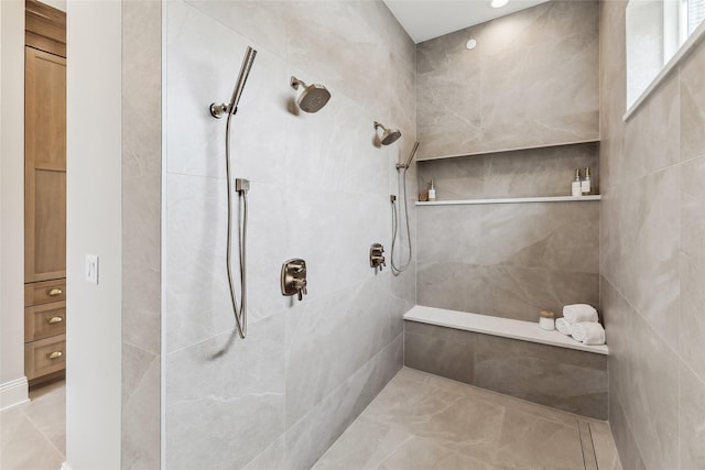 18252 Valleyview Cir, Clive, IA 50325 - bathroom featuring a tile shower and tile patterned floors