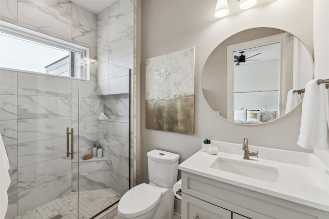 18252 Valleyview Cir, Clive, IA 50325 - full bath with a marble finish shower, toilet, a ceiling fan, and vanity
