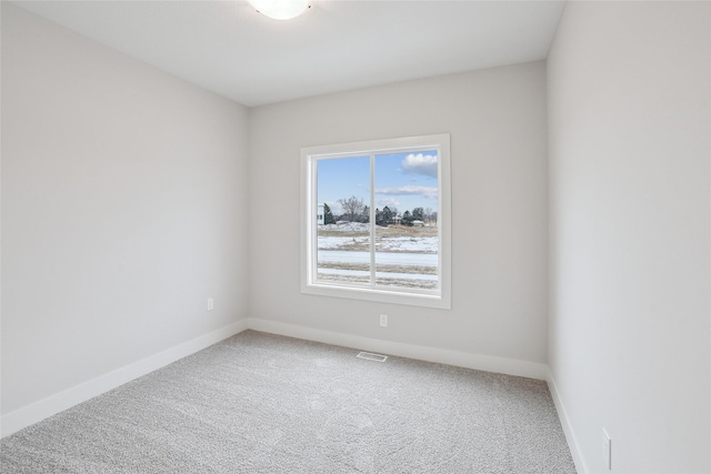 view of carpeted spare room