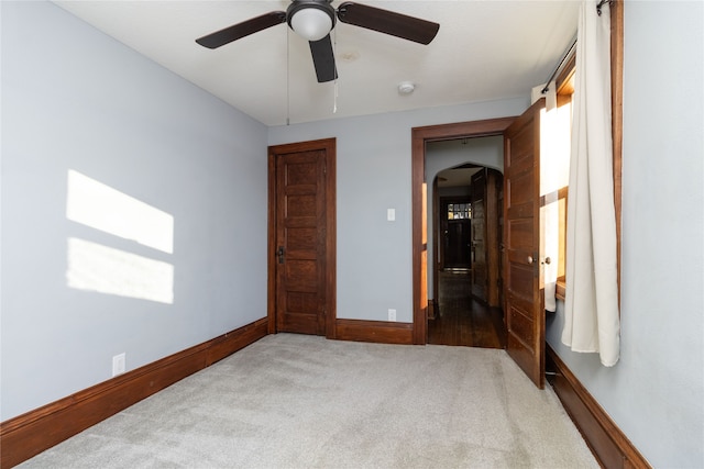 bedroom featuring ceiling fan and carpet floors