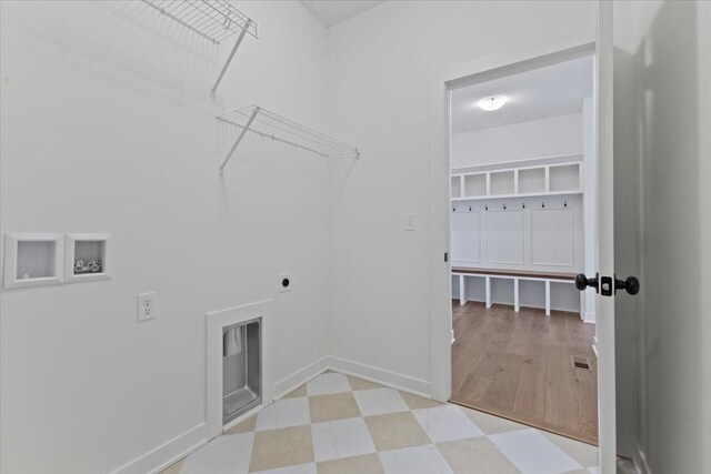 washroom featuring hookup for an electric dryer and washer hookup