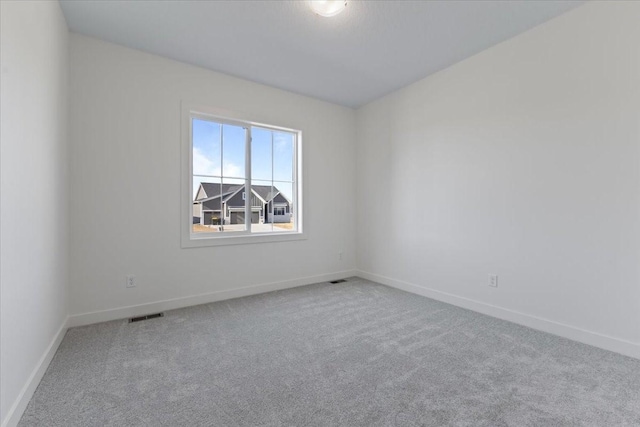 empty room with carpet floors